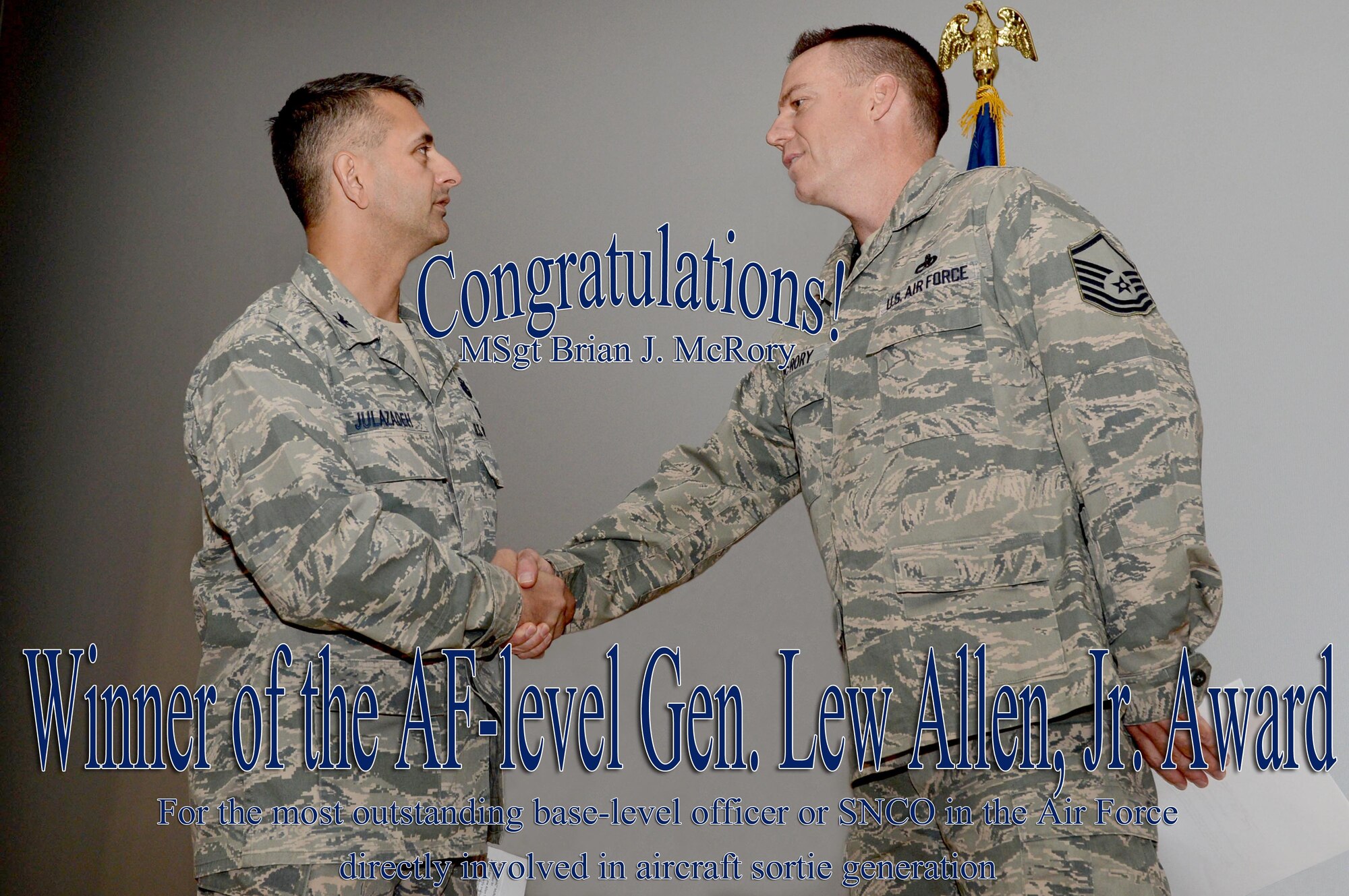 SPANGDAHLEM AIR BASE, Germany -- U.S. Air Force Col. David Julazadeh, 52nd Fighter Wing commander, congratulates Master Sgt. Brian J. McRory, 52nd Aircraft Maintenance Squadron, for his selection as the U.S. Air Force winner of the Gen. Lew Allen, Jr. award. This award is given to the most outstanding base-level senior non-commissioned officer directly involved in aircraft sortie generation and production. (U.S. Air Force photo illustration by Airman 1st Class Sarah Denewellis/Released)
