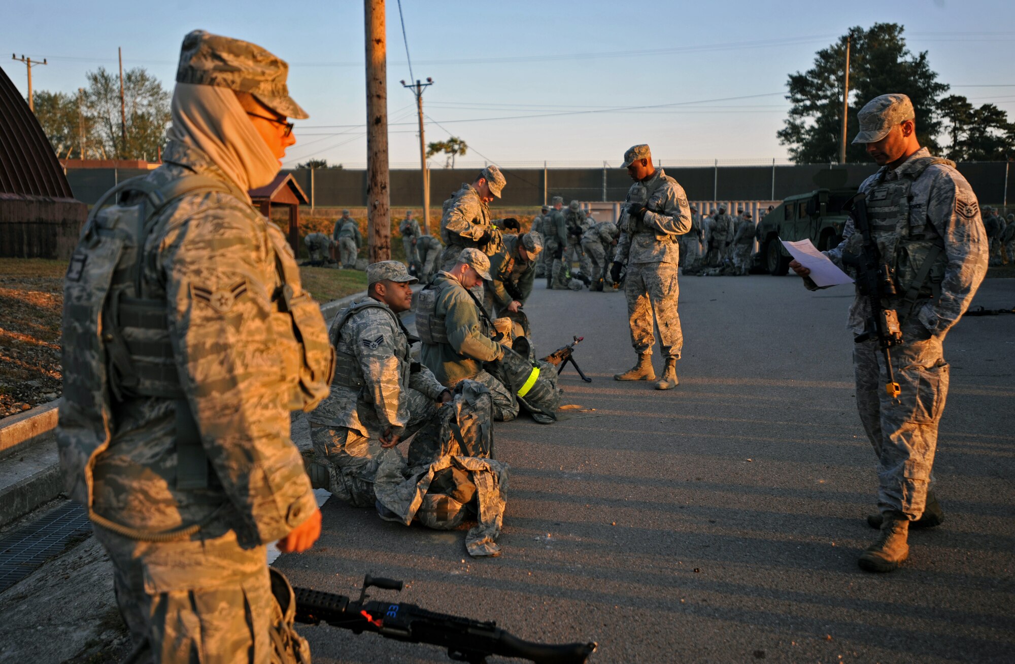 Members of the 51st Security Forces Squadron conduct a gear inspection during a field training exercise at Osan Air Base, Republic of Korea, Oct. 17, 2013. The exercise participants were charged with bringing enough gear to last them 48 hours in the field. (U.S. Air Force photo/Senior Airman Siuta B. Ika)
