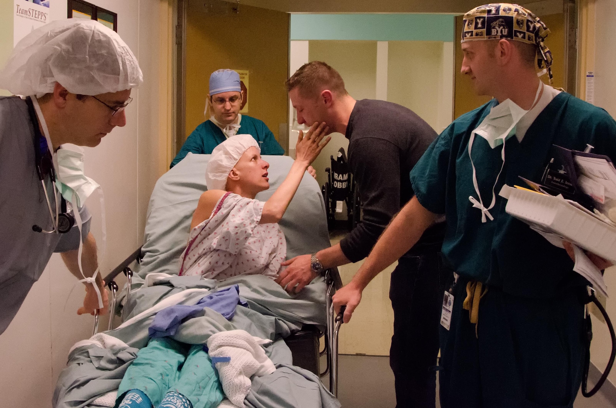 Capt. Candice Adams and her fiance Maj. Ryan Ismirle say their goodbyes before Adams is taken to surgery for a bilateral mastectomy on May 5, 2011. 
