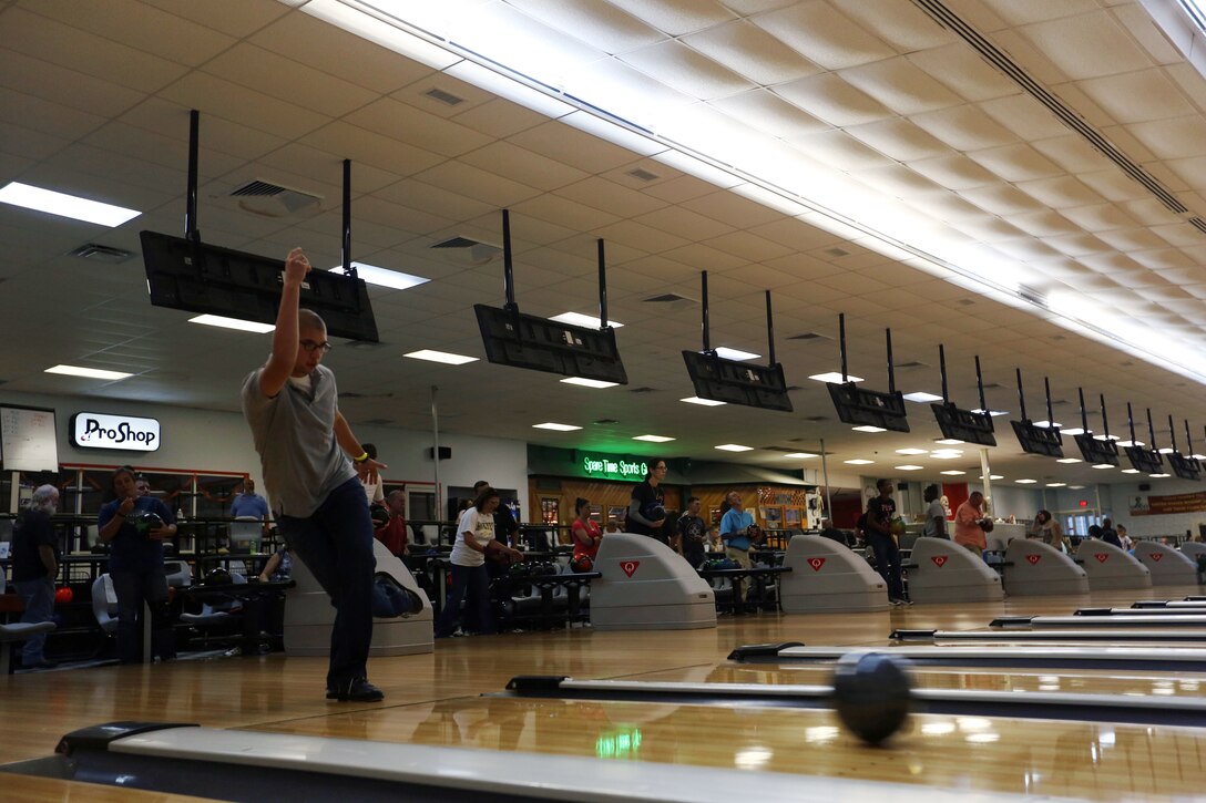 Milo M. Mata, a Nine Pin No Tap Tournament bowler, bowls during the tournament at the Bonnyman Bowling Center aboard Marine Corps Base Camp Lejeune, Oct. 19. To compete in the next tournament Nov. 16, register at the bowling center by 5:30 p.m. the day of the competition.