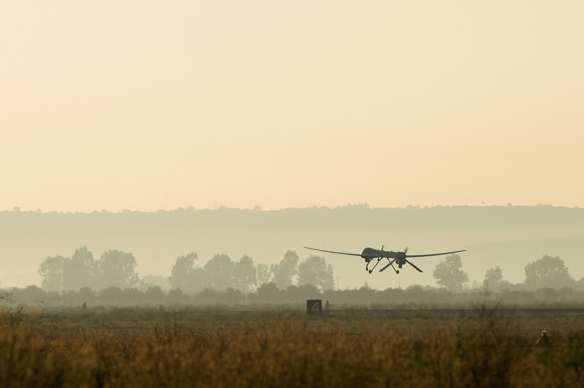 An MQ-1 Predator unmanned aerial vehicle attached to the 324th Expeditionary Reconnaissance Squadron takes off Oct. 22, 2013. (U.S. Navy photo/Mass Communication Specialist 2nd Class Brian T. Glunt)