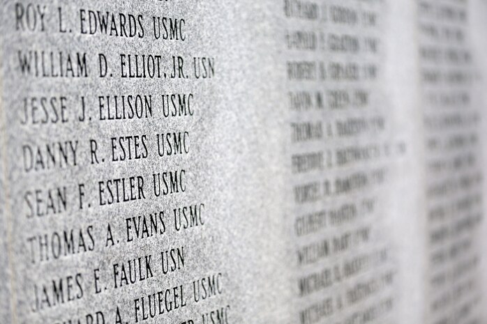 Names of the fallen Beirut service members are carved into the stone of the Beirut Memorial at Lejeune Memorial Gardens in Jacksonville, N.C., Oct. 23. More than 300 service members, family members, veterans and local residents
paid their respects during the Beirut Memorial Observance Ceremony to those lost during the Beirut Embassy bombing 30 years ago.
