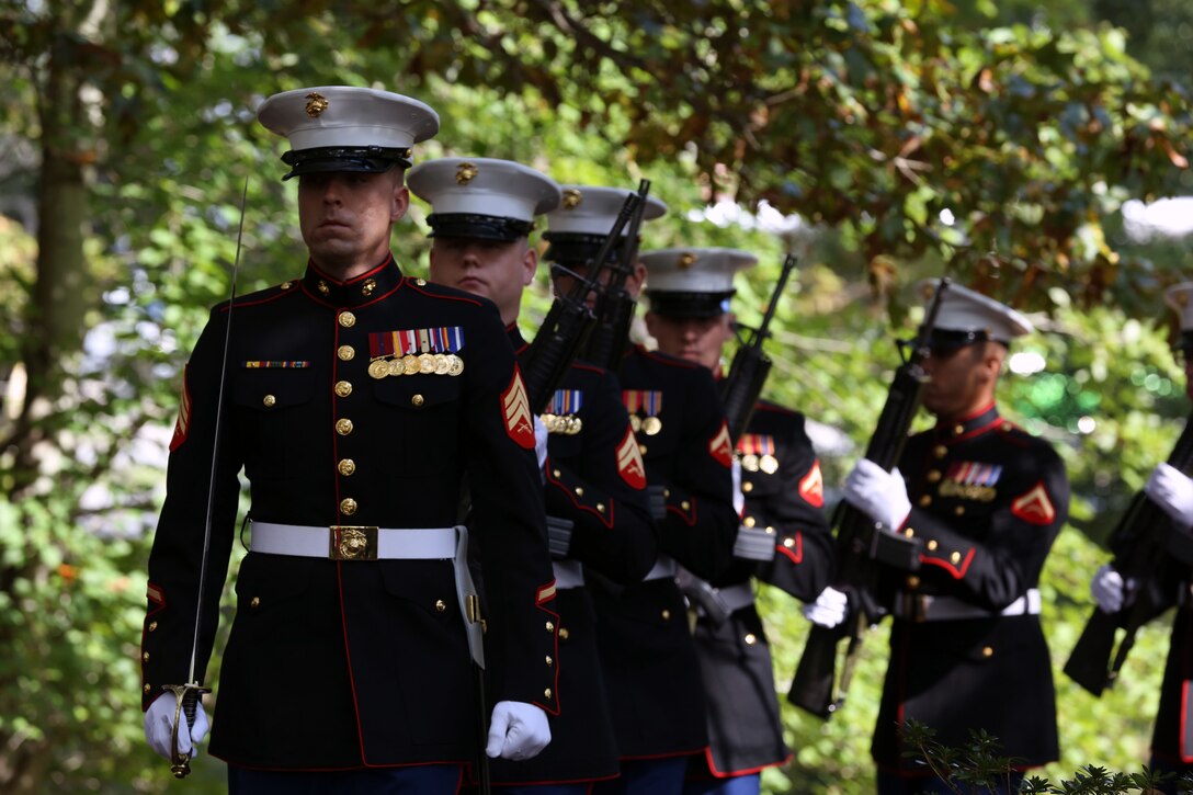 Marines with 8th Marine Regiment march from behind the Beirut Memorial during the Beirut Memorial Observance Ceremony at the Lejeune Memorial Gardens in Jacksonville, N.C., Oct. 23. The Marines fired a 21-gun salute
during the ceremony.
