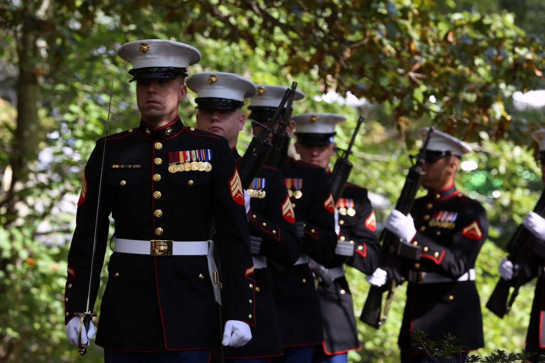 Marines with 8th Marine Regiment march from behind the Beirut Memorial during the Beirut Memorial Observance Ceremony at the Lejeune Memorial Gardens in Jacksonville, N.C., Oct. 23. The Marines fired a 21-gun salute
during the ceremony.
