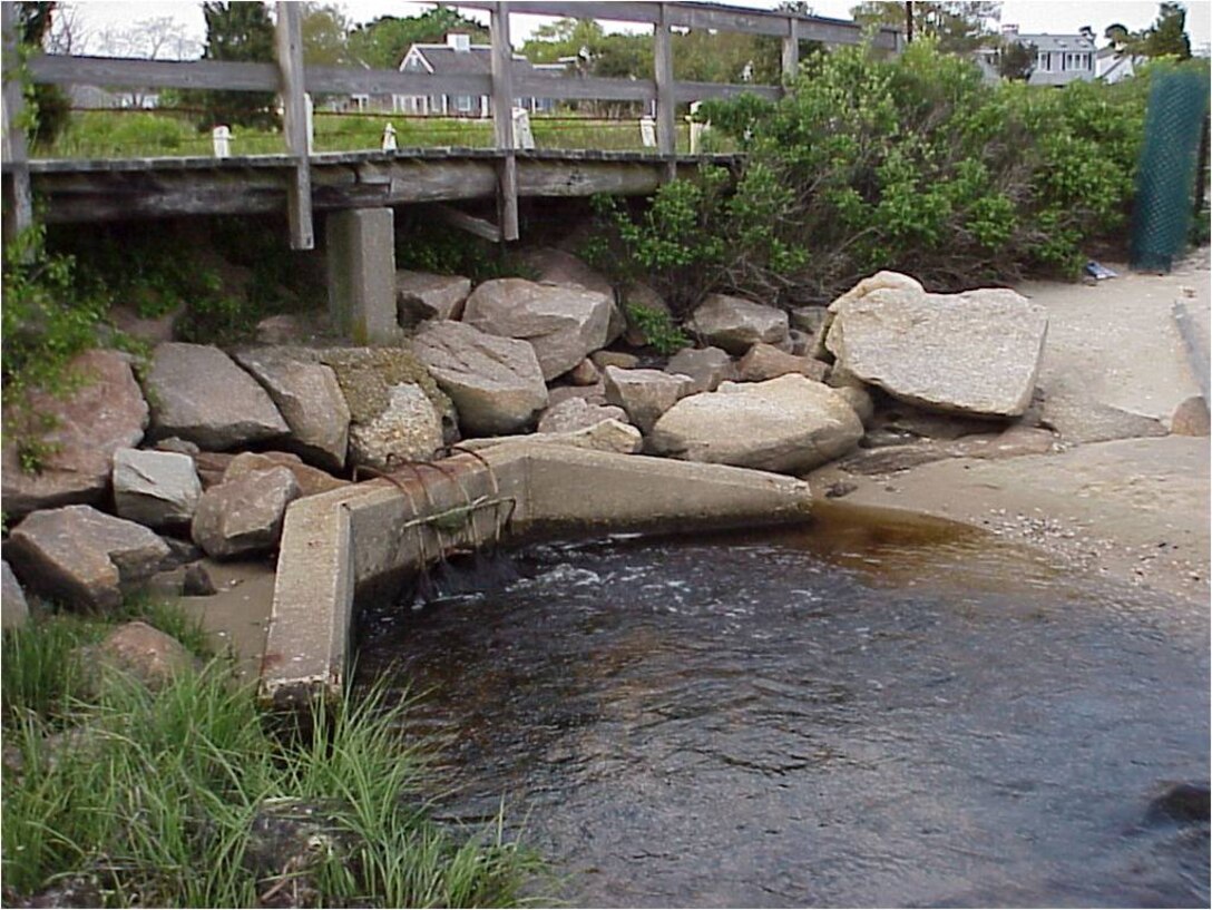 Only a 3-foot diameter culvert connected Stewart’s Creek to salt water in Hyannis Harbor prior to the restoration project. The undersized culvert restricted tidal flushing and reduced the quality of estuarine resources on the upstream side. The Stewart’s Creek Estuary Restoration Project is restoring approximately 14 acres of salt marsh and estuarine habitat in lower Stewart’s Creek.