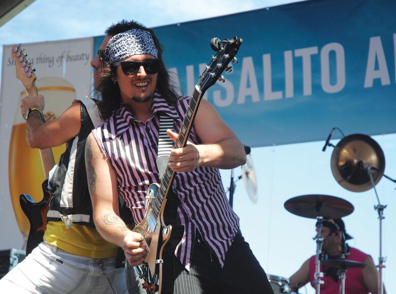 Members of Tainted Love, an 80s rock cover band, kept crowds on their feet Sept. 1 during the Sausalito Art Festival. Other notable acts included Psychedelic Furs and Lisa Marie Presley. 