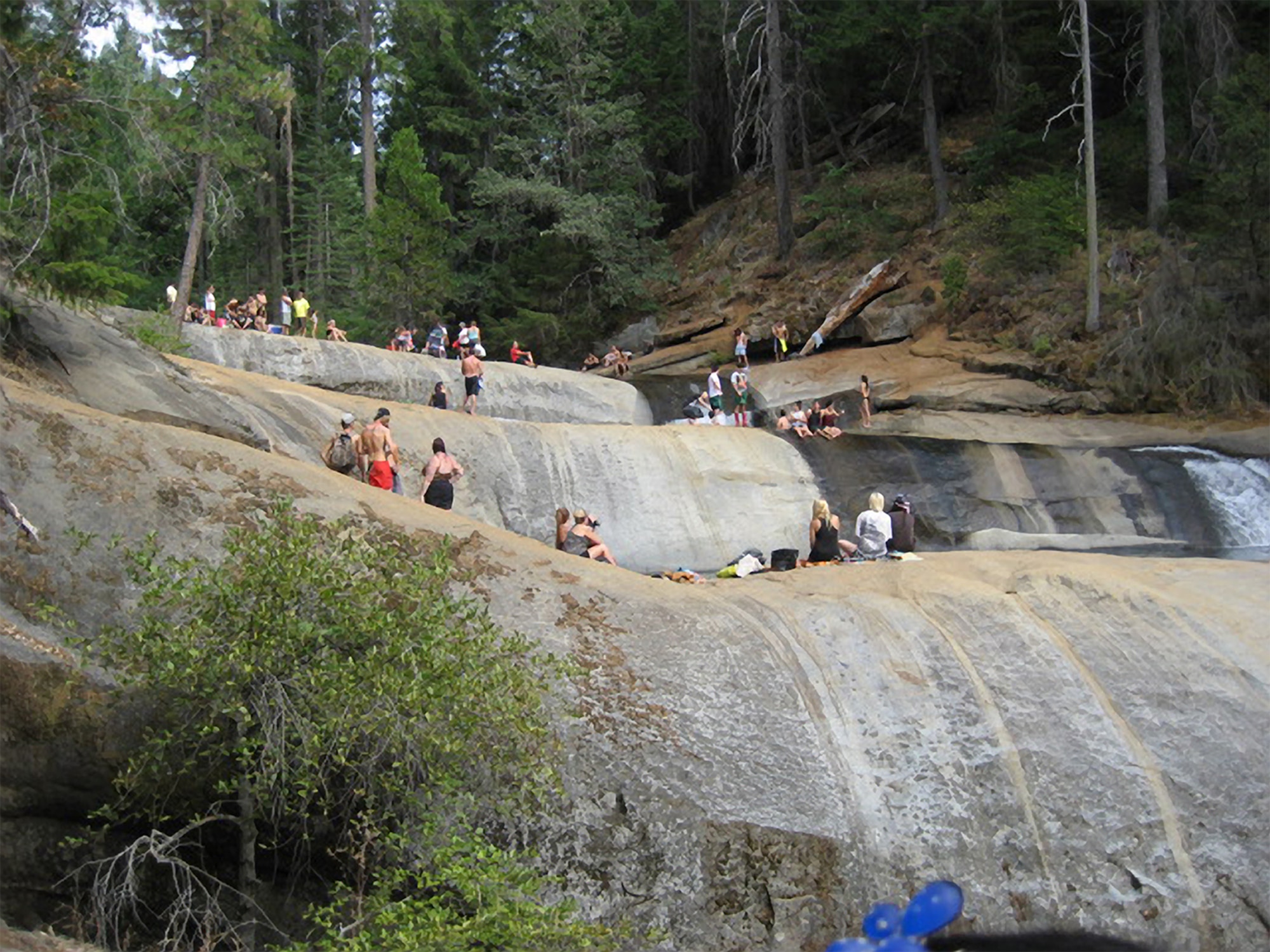 To beat the summer heat, locals flock to a popular swimming hole at University Falls in a remote canyon of the Sierra foothills near Beale AFB, Calif. Area emergency services have responded to a dramatic increase in rescues from the isolated location in recent years. (Courtesy photo)