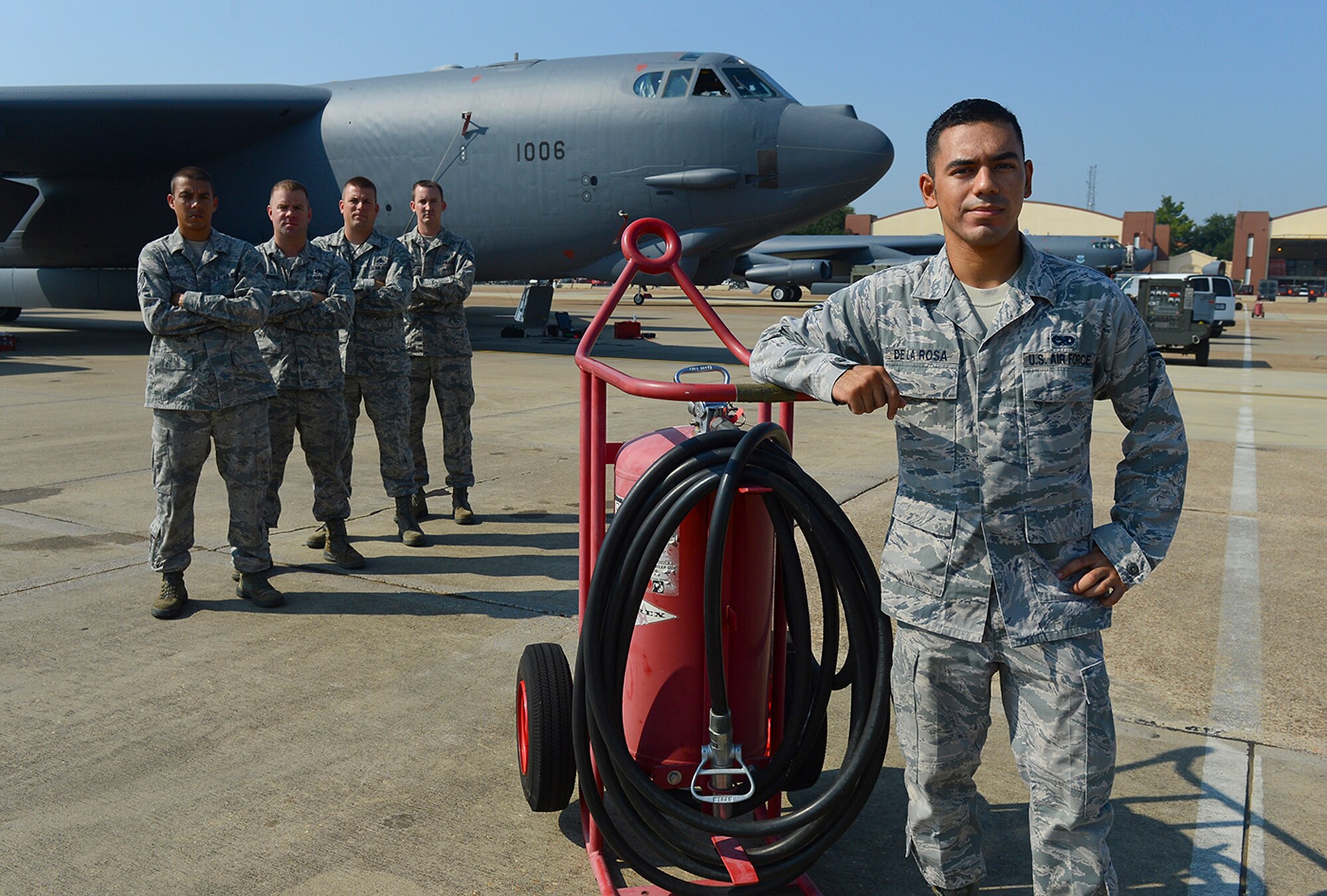 Five heroic maintainers, led by Airman 1st Class Elias Delarosa (front), acted quickly by evacuating the aircrew and controlling the fire until the Barksdale Fire Department arrived. (U.S. Air Force photo by Senior Airman Micaiah Anthony/ Released)