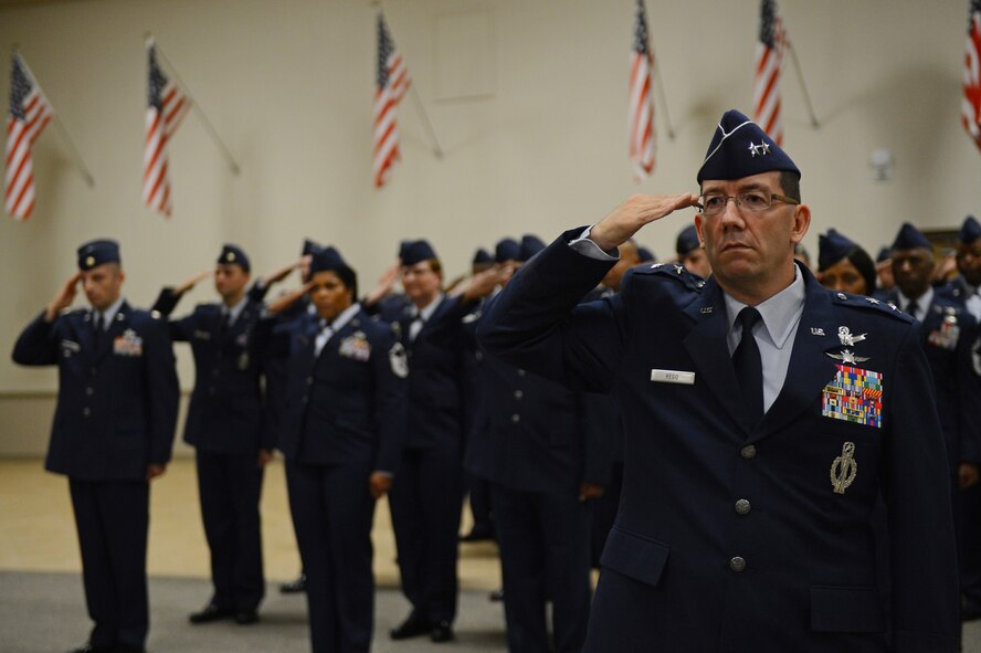 Maj. Gen. Robert Rego, Air Force Global Strike Command interim vice commander, and Airmen from the command salute during the presentation of the colors at the AFGSC change of command ceremony at Barksdale Air Force Base, La., Oct. 23, 2013. (U.S. Air Force photo/Senior Airman Micaiah Anthony)