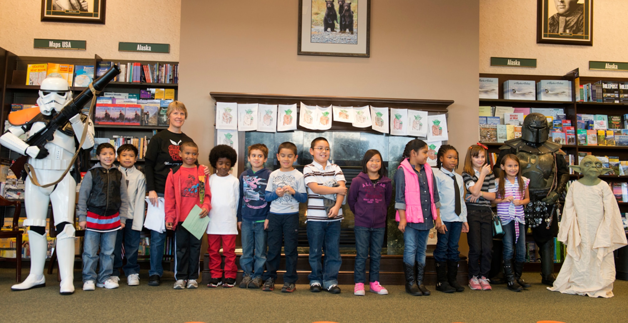Students and teachers from College Gate Elementary School pose with members of the 501st Legion, Vader's Fist, at Barnes & Noble in Anchorage Oct. 5. The legion participated in the second annual Star Wars Reads Day and promoted reading to the children and adults at the bookstore. (Courtesy Photo)