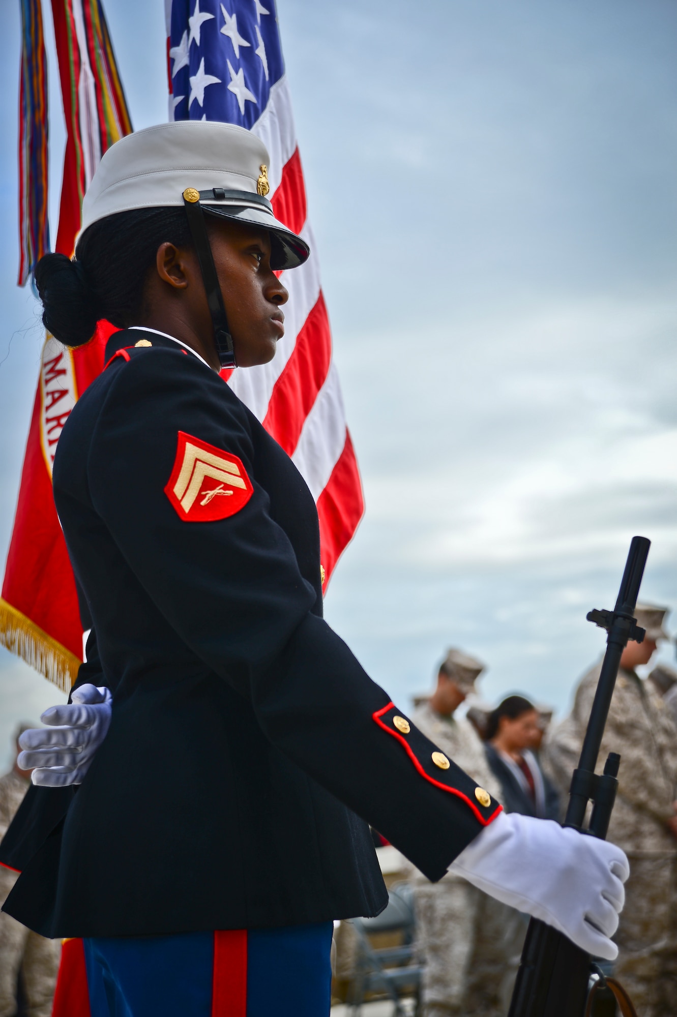 A Marine corporal stands at parade rest during an invocation at the Beirut memorial observance at MacDill Air Force Base, Fla., Oct. 23, 2013. A detail of Marine honor guardsmen presented the colors at the memorial. (U.S. Air Force photo by Staff Sgt. Brandon Shapiro/Released)
