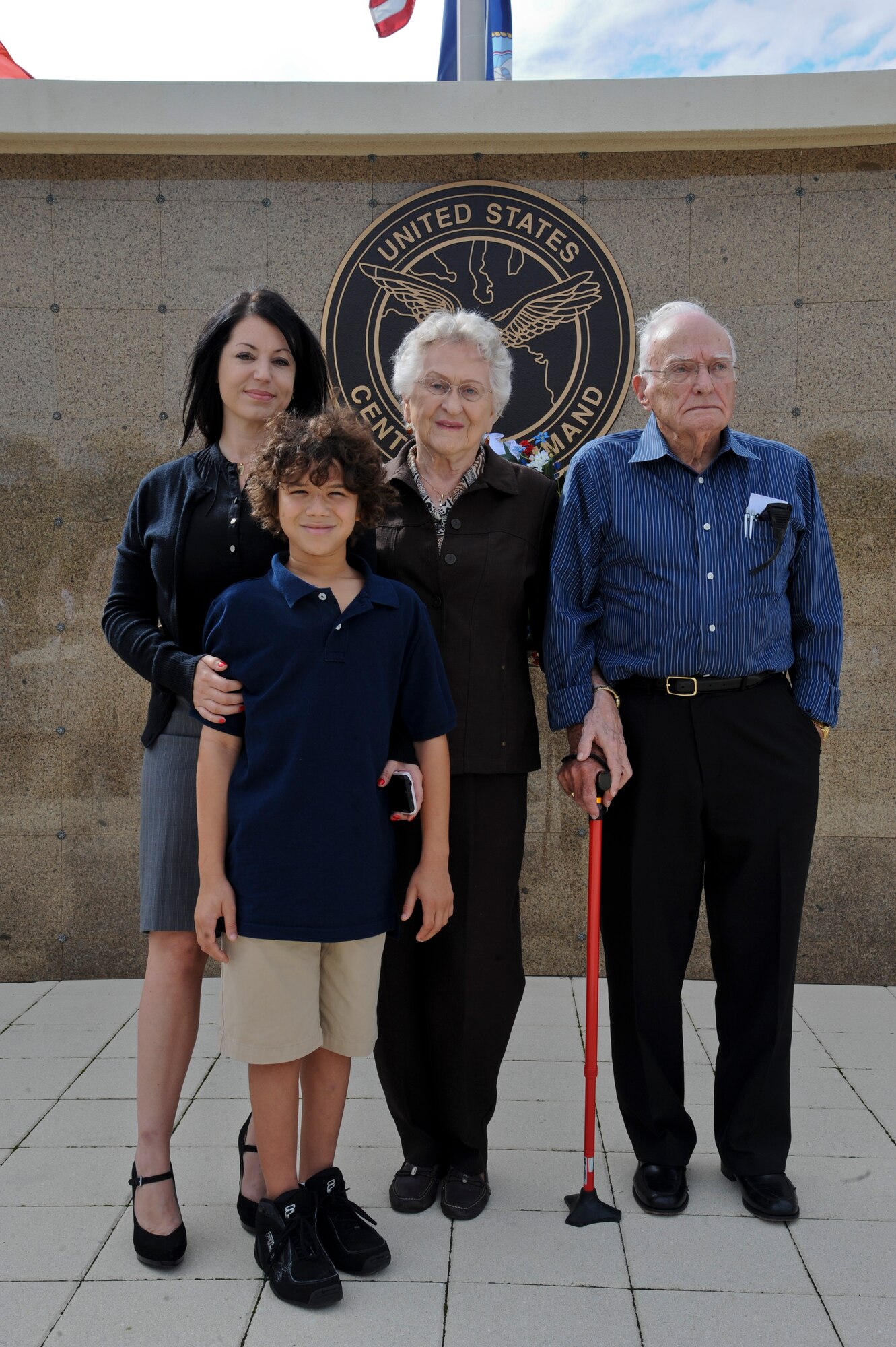 The family of Staff Sgt. John R. Weyl, a Marine killed in the 1983 Beirut barracks bombing, stand at the Beirut memorial observance at MacDill Air Force Base, Fla., Oct. 23, 2013. Behind Weyl’s family is a ceremonial wreath, presented in remembrance of the more than 240 servicemembers killed in the 1983 Beirut barracks bombing. (U.S. Air Force photo by Airman 1st Class Ned T. Johnston/Released)