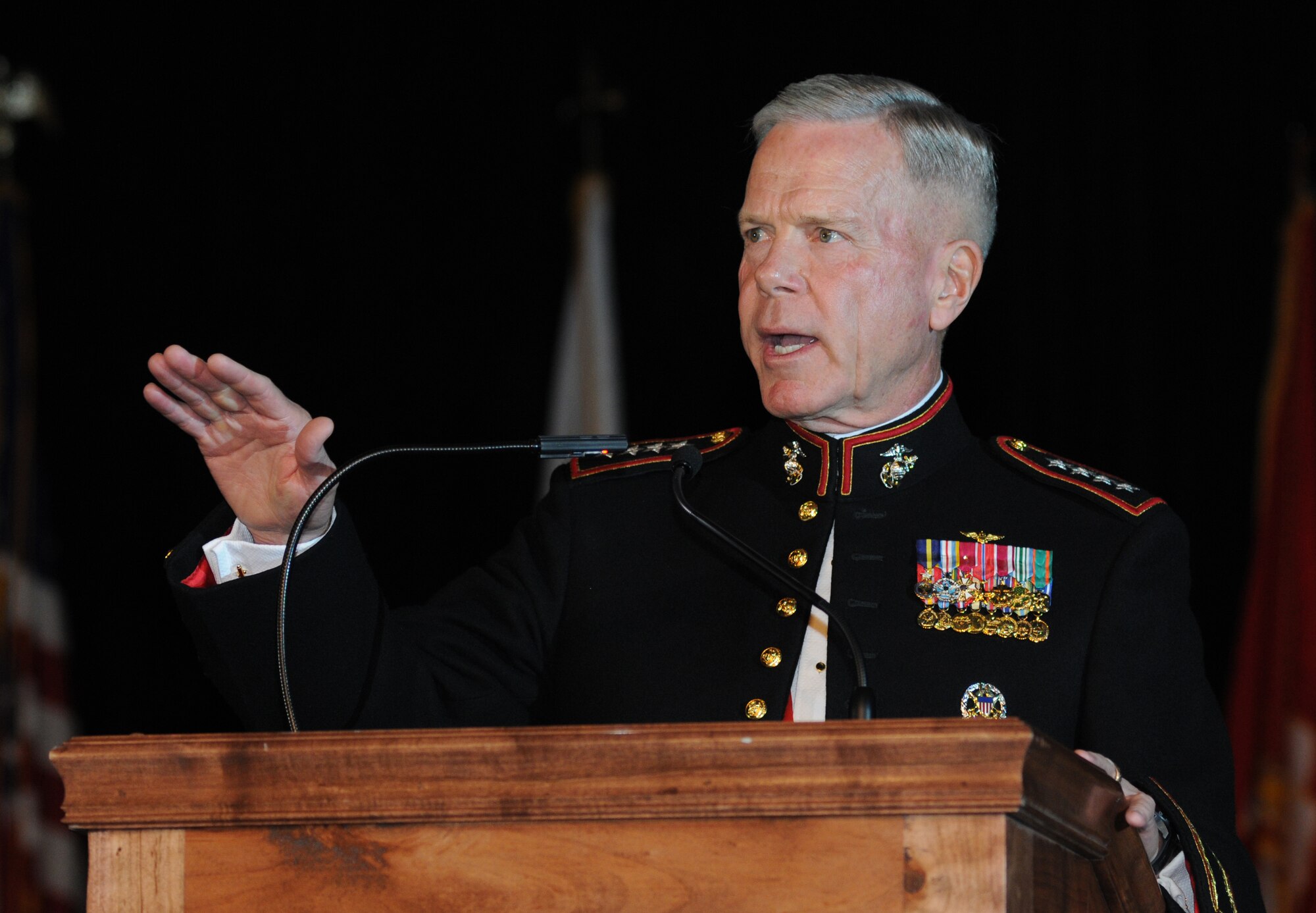 Gen. James Amos, Commandant of the Marine Corps, delivers remarks during the reception of the 35th Annual Salute to the Military Oct. 22, 2013, at the Mississippi Coast Coliseum in Biloxi, Miss.  (U.S. Air Force photo by Kemberly Groue)