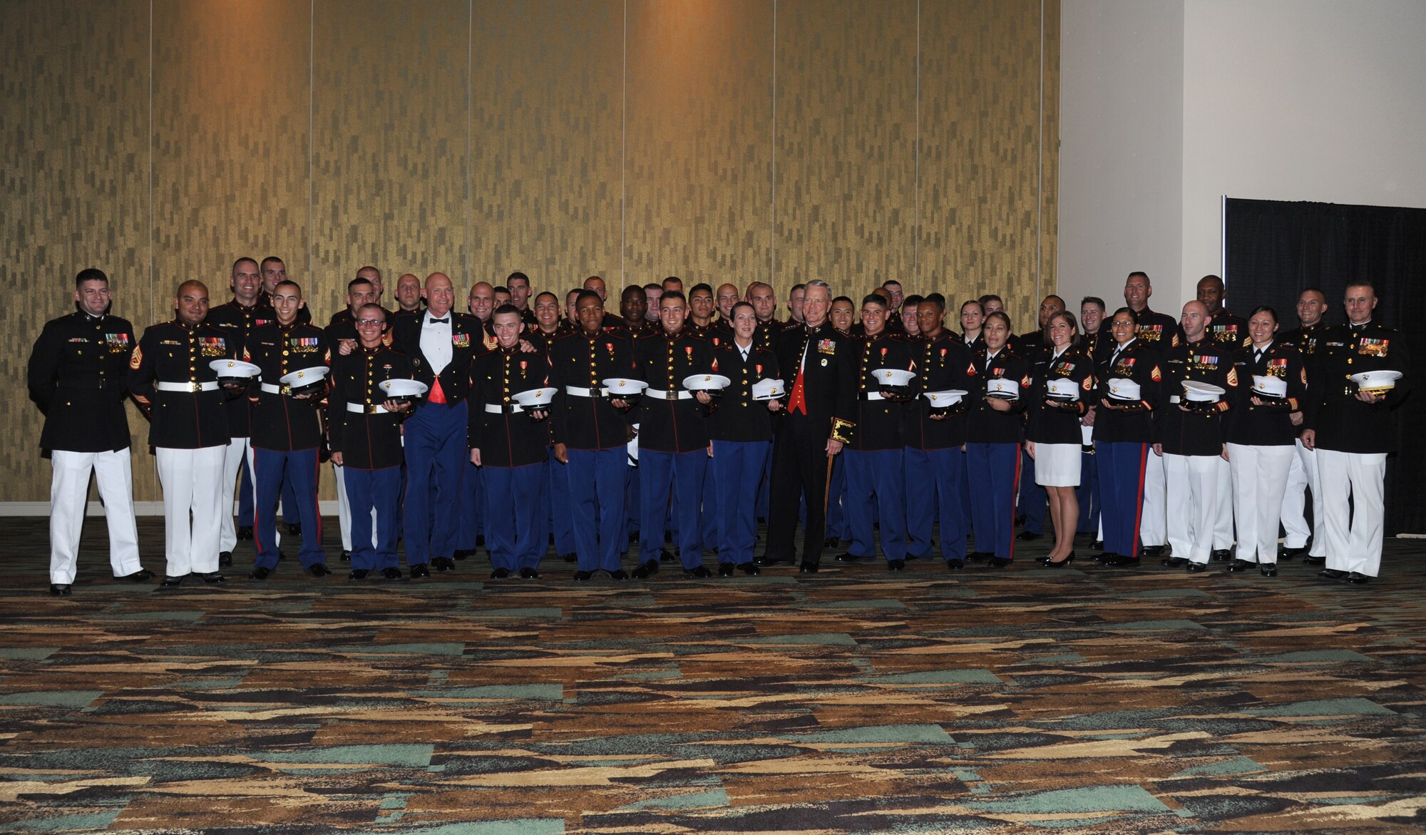 Gen. James Amos, Commandant of the Marine Corps, and members of the Keesler Marine Detachment prepare for the reception of the 35th Annual Salute to the Military Oct. 22, 2013, at the Mississippi Coast Coliseum in Biloxi, Miss.  Amos was the guest speaker for the event.  (U.S. Air Force photo by Kemberly Groue)
