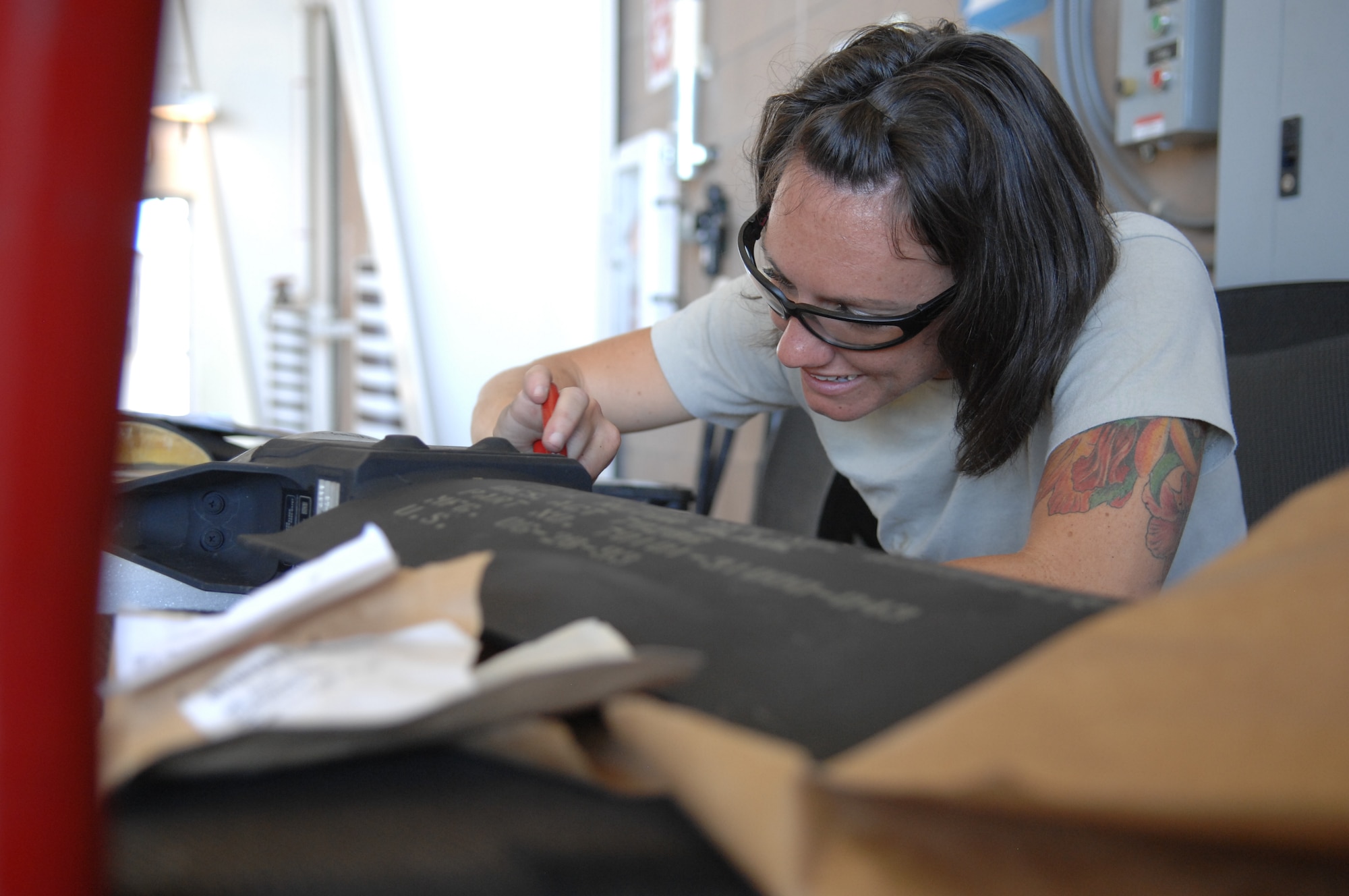 Staff Sgt. Savannah Lopez, 923rd Aircraft Maintenance Squadron electronic and environmental journeyman, changes a defroster plug on an HH-60G Pave Hawk tail rotor at Davis-Monthan Air Force Base, Ariz., Oct. 18, 2013. The defrosters are designed to keep the rotor blades fromdeveloping ice, which can be hazardous during flight. (U.S. Air Force photo by Betty R. Chevalier/Released)
