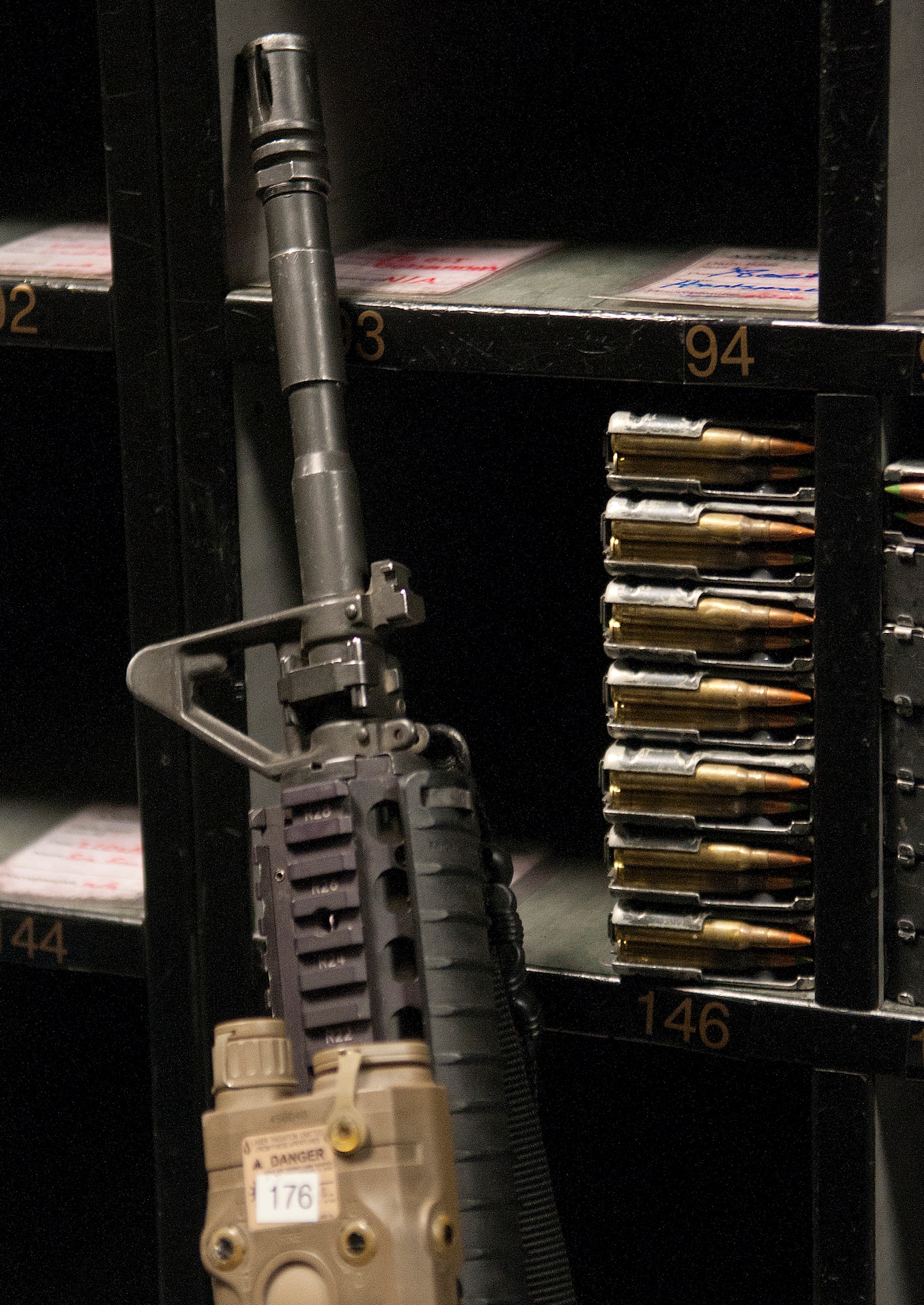 131021-F-JW079-042
An M4 rifle rests alongside an armory shelf containing ammunition Oct. 21, 2013. The Armory is controlled by the 90th Security Support Squadron, F.E. Warren Air Force Base, Wyo., which is charged with safeguarding, storing and maintaining more than 1,600 weapons and ammunition. (U.S. Air Force photo by R.J. Oriez)
