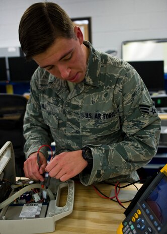 Senior Airman Dana Hill, 99th Medical Support Squadron biomedical equipment technician, uses an oscilloscope to ensure there is no break in wiring or circuitry on an aspirator at the Mike O’Callaghan Federal Medical Center, Oct. 17, 2013, at Nellis Air Force Base, Nev.  Biomedical equipment technicians install, inspect, repair and modify biomedical equipment and support systems. Some of their daily tasks include preventive maintenance, safety inspections, and mechanical and electronic troubleshooting. (U.S. Air Force photo by Airman 1st Class Jason Couillard)