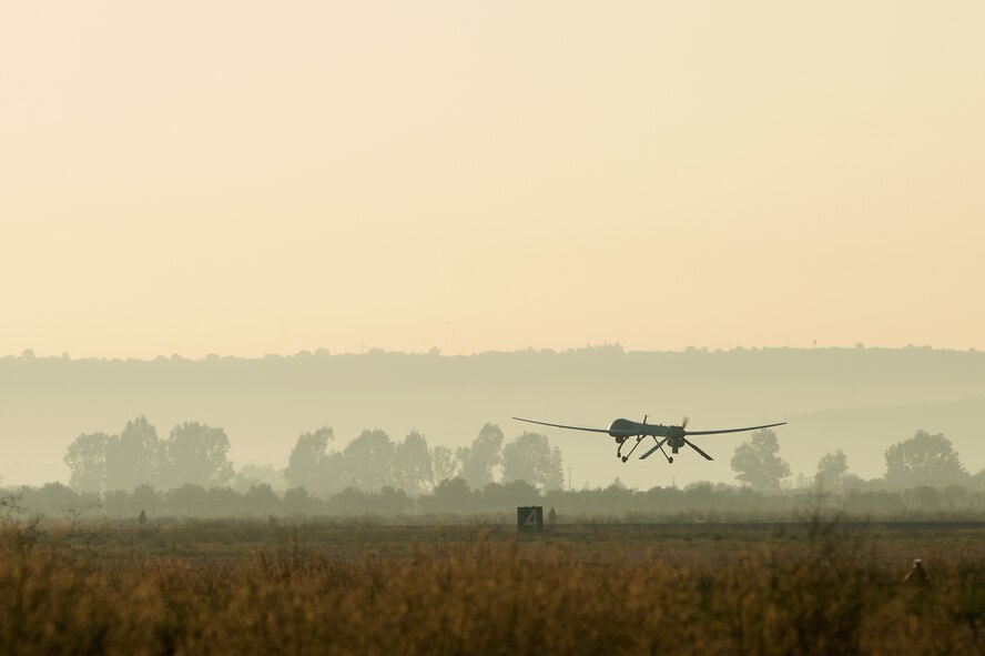 An MQ-1 Predator takes off from an undisclosed location, during the aircrafts sortie, Oct. 22, 2013, it surpassed the 2 million flying hour mark. Since initial operations began in 1995 to April 2011 the wing flew their first 1 million hours. Due in large part to total force integration efforts and an expansion of combat air patrols the 2 million hour mark was achieved 32 months later, culminating in more than 215,000 total missions completed and nearly 94-percent of all missions flown in support of major combat operations. (U.S. Navy photo by Mass Communication Specialist 2nd Class Brian T. Glunt/Released)