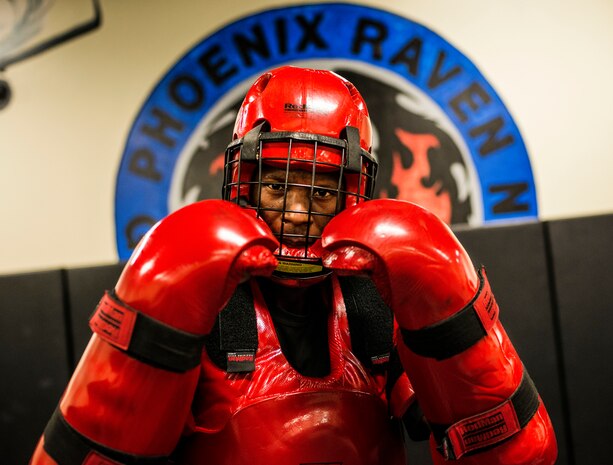 Master Sgt. Danyon Blair, 628th Security Forces Squadron Phoenix Raven instructor, holds his fists up while wearing the Redman suit used to simulate an “aggressor” during a Phoenix Raven training session Oct. 10, 2013, at Joint Base Charleston, S.C. Blair and several other Phoenix Raven instructors put three security forces members through a three-week course at the JB Charleston Phoenix Raven facility to prepare them for the Phoenix Raven training course at the United States Air Force Expeditionary Center at Joint Base McGuire-Dix-Lakehurst, N.J. (U.S. Air Force photo/ Senior Airman Dennis Sloan)