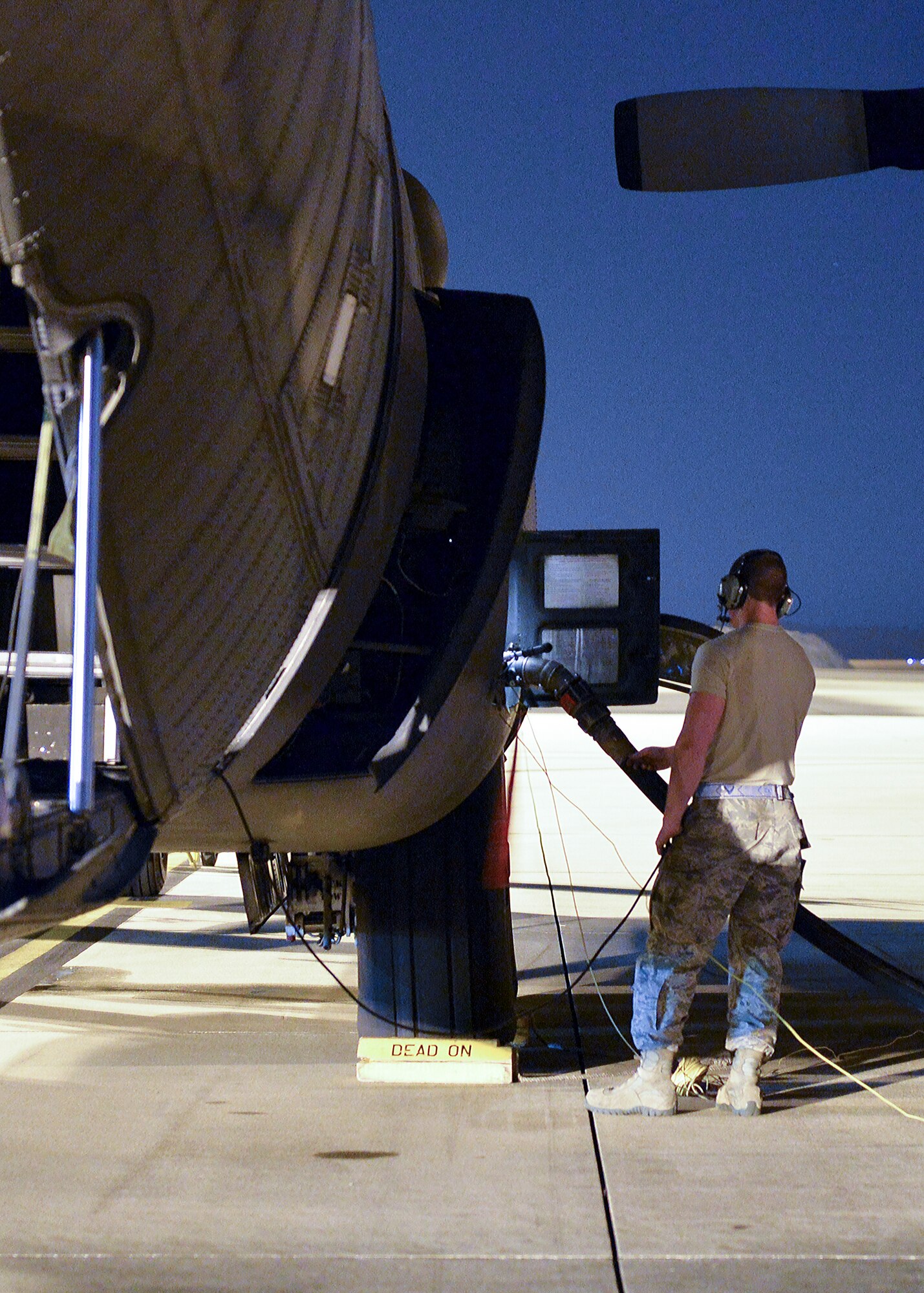 Airman 1st Class Steven Berry, 1st Special Operations Aircraft Maintenance Squadron crew chief monitors the fuel levels during the refueling of an AC-130U Spooky on the flightline at Hurlburt Field, Fla., Oct. 23, 2013. "Having a full tank of gas and good overall maintenance ensures aircraft can launch at a moment’s notice," Berry said. (U.S. Air Force Photo/Airman 1st Class Jeff Parkinson)

