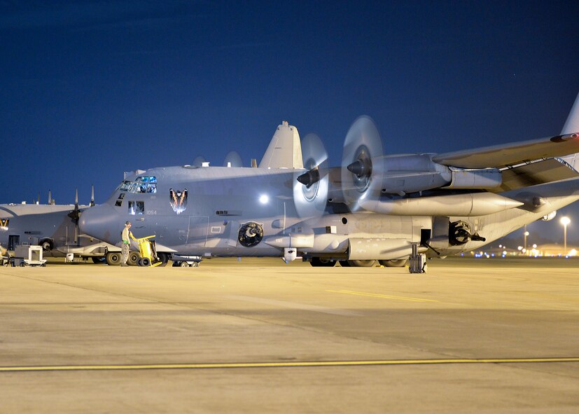 An AC-130U Spooky returns to the flightline after a night training mission at Hurlburt Field, Fla., Oct. 23, 2013. Many gunship missions are flown at night, which is why they frequently train at night. (U.S. Air Force Photo/Airman 1st Class Jeff Parkinson)