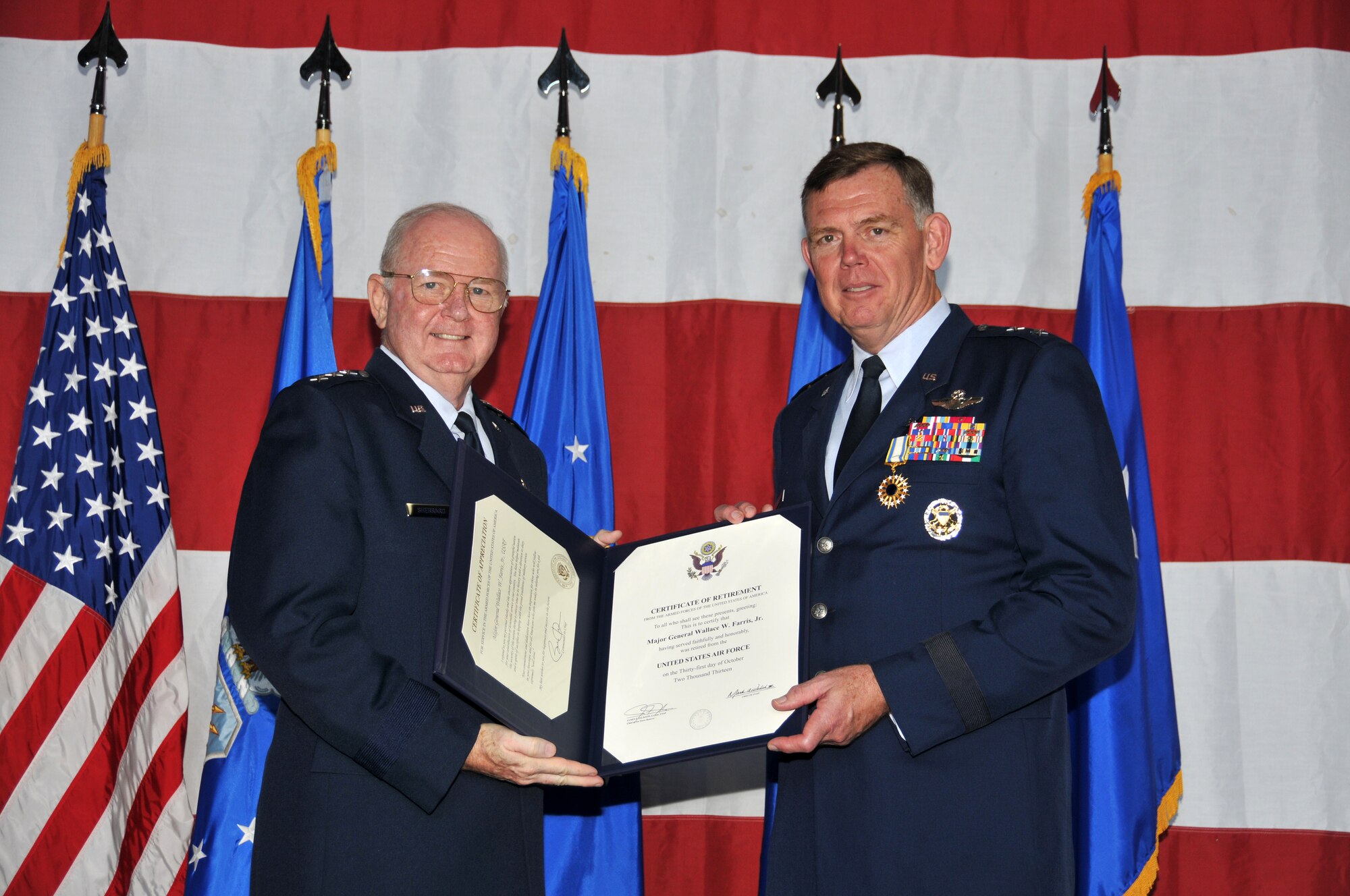Maj. Gen. Wallace "Wade" Farris Jr., 22nd Air Force commander, was honored at his retirement ceremony held Oct. 5 at Hanger 5 for his 39 years of military service and leadership. The presiding officer was retired Lt. Gen. James E. Sherrard III, former Chief of Air Force Reserve, Headquarters U.S. Air Force, Washington D.C., and commander, Air Force Reserve Command. (U.S. Air Force photo/Senior Airman Elizabeth Van Patten)
