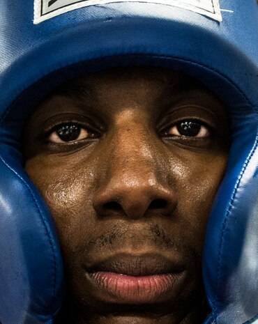 Senior Airman Martin Jackson, 628th Security Forces Squadron patrolman, wears protective head gear while training at the Joint Base Charleston Phoenix Raven facility Oct. 10, 2013, at Joint Base Charleston, S.C. The three week course at JB Charleston consisted of combatives training as well as self-defense drills with memorization exercises scattered throughout to prepare Jackson and two other security forces members the Phoenix Raven training course at the United States Air Force Expeditionary Center at Joint Base McGuire-Dix-Lakehurst, N.J. (U.S. Air Force photo/ Senior Airman Dennis Sloan)
