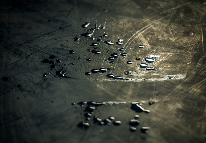 Drops of sweat are sprinkled around the mats at the Joint Base Charleston Phoenix Raven training facility after three security forces members went through a three-week course to prepare them for the Phoenix Raven training course at the United States Air Force Expeditionary Center at Joint Base McGuire-Dix-Lakehurst, N.J. The training course at the USAF consists of instruction and realistic practical exercises in antiterrorism/force protection, weapon system security, verbal judo, combatives, tactical baton employment and advanced firearms proficiency. (U.S. Air Force photo/ Senior Airman Dennis Sloan)