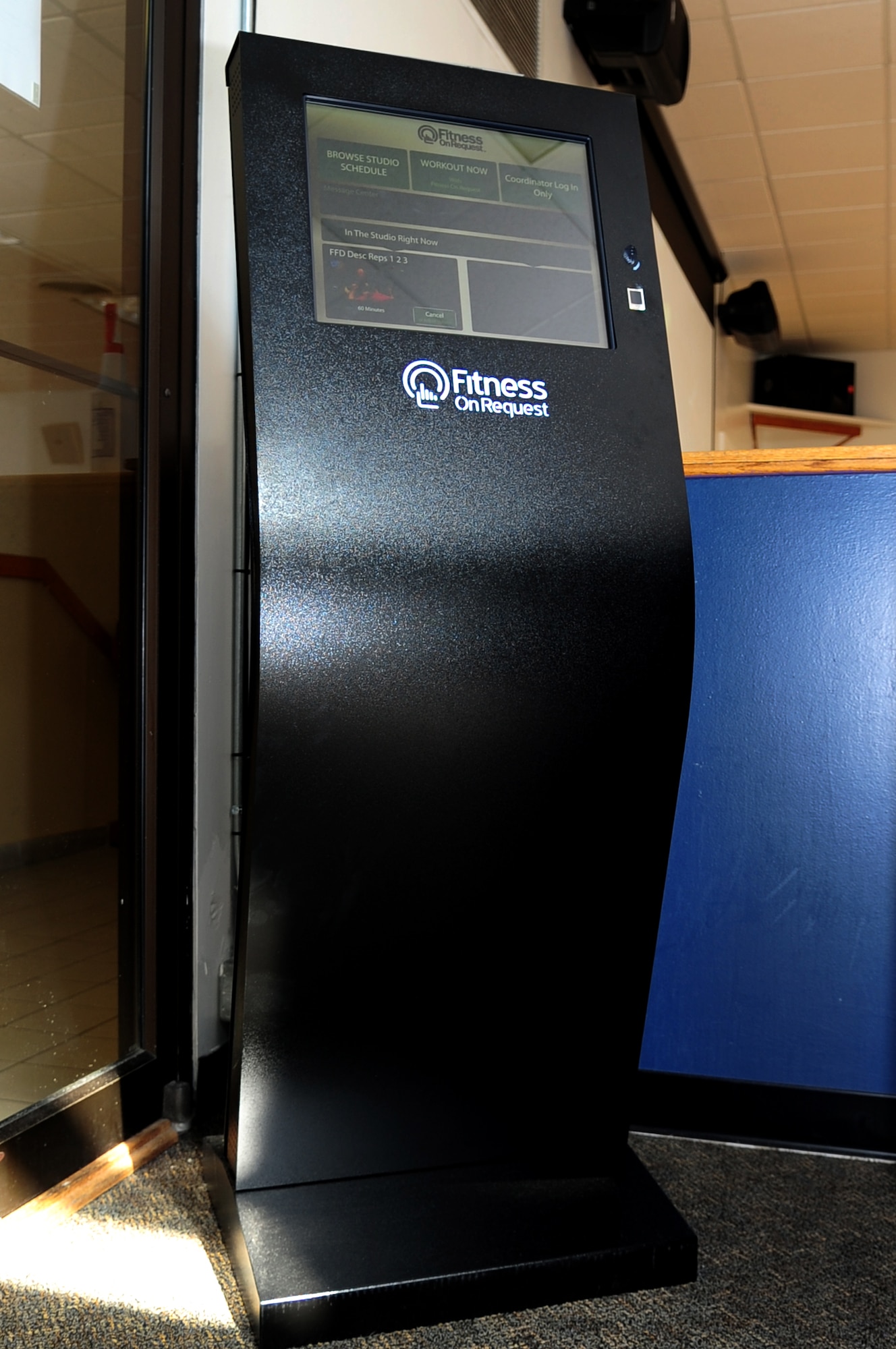 The Air Combat Command and Shellbank Fitness Centers on Langley Air Force Base, Va., recently introduced a fitness kiosk, “Elements,” designed to eliminate the need for a fitness instructor to be physically present during classes. When rooms become available, squadrons and other groups are given the opportunity to make reservations to utilize the new program. (U.S. Air Force by Airman Areca T. Wilson/Released)