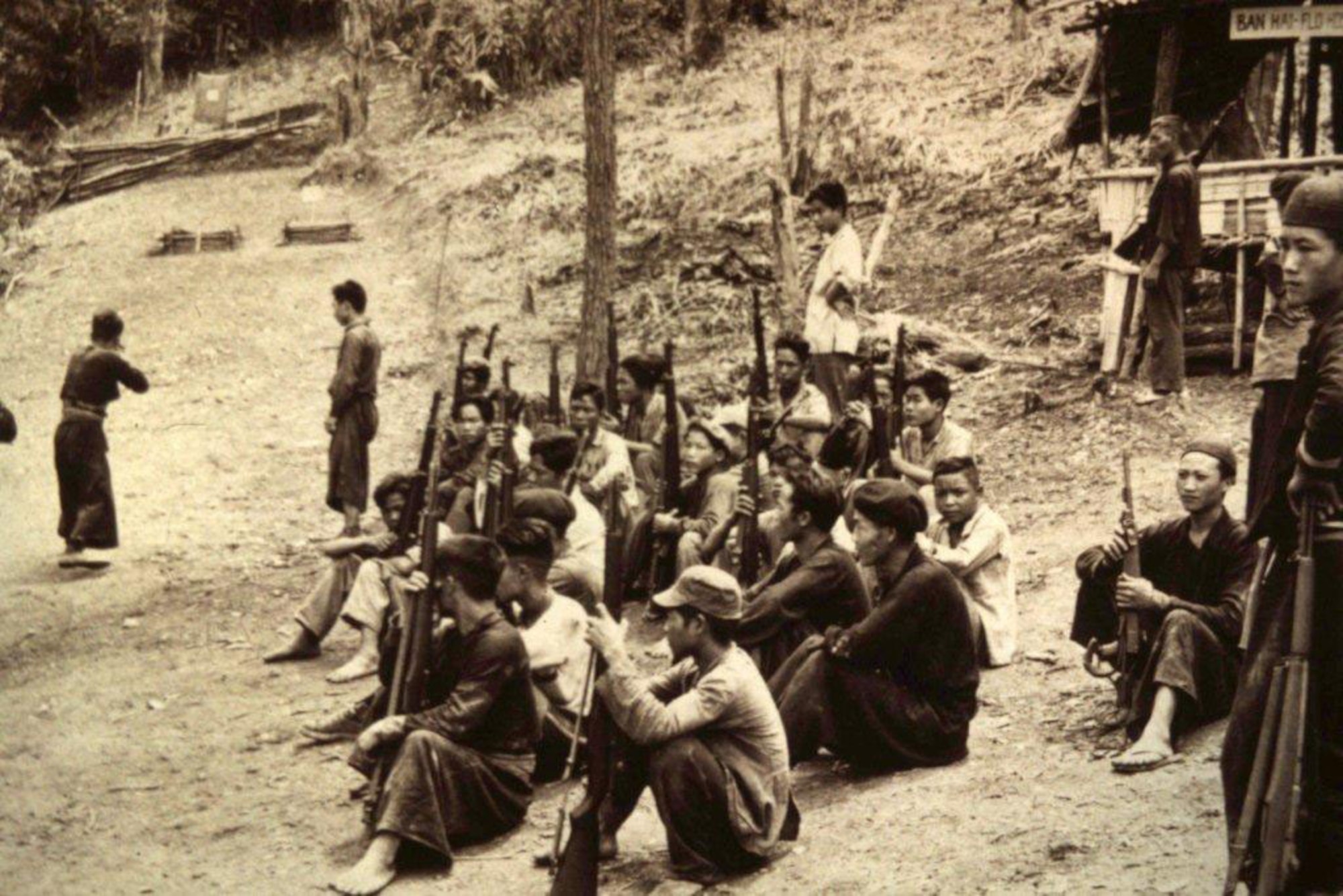 Rifle training for new Hmong recruits, early 1960s, northern Laos. (Courtesy of Hmong Archives)