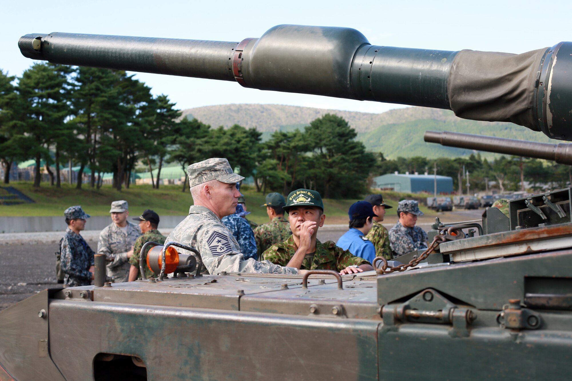 U.S. Forces Japan and Fifth Air Force Command Chief Master Sgt. James
Laurent, Senior Enlisted Advisor to the Chief of Staff, Japan Joint Staff
Warrant Officer Mitsunori Watanabe, and 374th Airlift Wing Command Chief
Master Sgt. Manuel Roblesreynoso attended a Senior Enlisted Leader (SEL)
Engagement at Camp Komakado, Camp Fuji and Camp Kiti-Fuji to gain a better
understanding of Japan Ground Self Defense Forces operations and
capabilities Sept. 27, 2013. During the visit American and Japanese SELs
learned how the JGSDF are trained; revealing similarities in the way U.S.
Forces and Japanese Forces conduct international operations. "I was
particularly impressed with their service in humanitarian and peacekeeping
operations around the globe," said Laurent. "The service members we met were
very impressive and I look forward to more bilateral engagements with them
in the future."