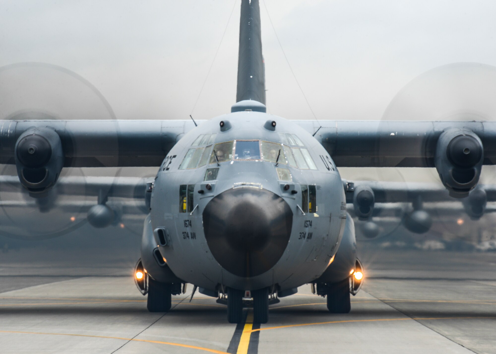 Ten C-130s taxi on the runway during a large formation mission at Yokota Air Base, Japan, Oct. 22, 2013.  The C-130s flew towards the Aomori region, testing Yokota’s capability to launch aircraft and assist anywhere in the Western Pacific region.  (U.S. Air Force photo by Airman 1st Class Soo C. Kim)