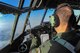 Col. Mark August, 374th Airlift Wing commander, pilots a C-130 Hercules over mainland Japan during a large formation mission on Oct. 22, 2013.  The surge showcased Yokota’s capability to perform airlift operations in the Western Pacific region.  (U.S. Air Force photo by Airman 1st Class Soo C. Kim/released)
