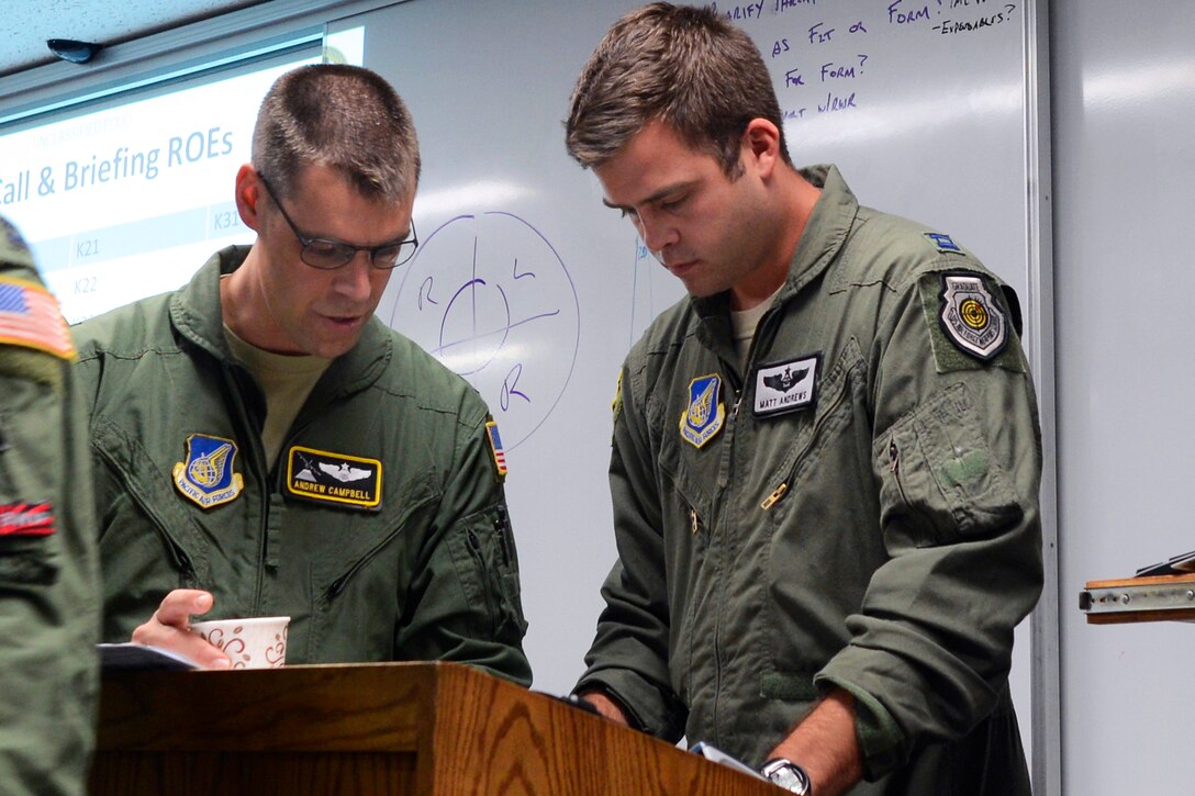 U.S. Air Force Lt. Col. Andrew Campbell, left, and U.S. Air Force Capt ...