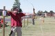 Capt. Michael Williams, 932nd Airlift Wing Protestant Chaplain, shows off his archery skills at the 3D Archery Shoot held during the 932nd AW annual family day. (Air Force photo by Staff Sgt. Meiko Schill.)