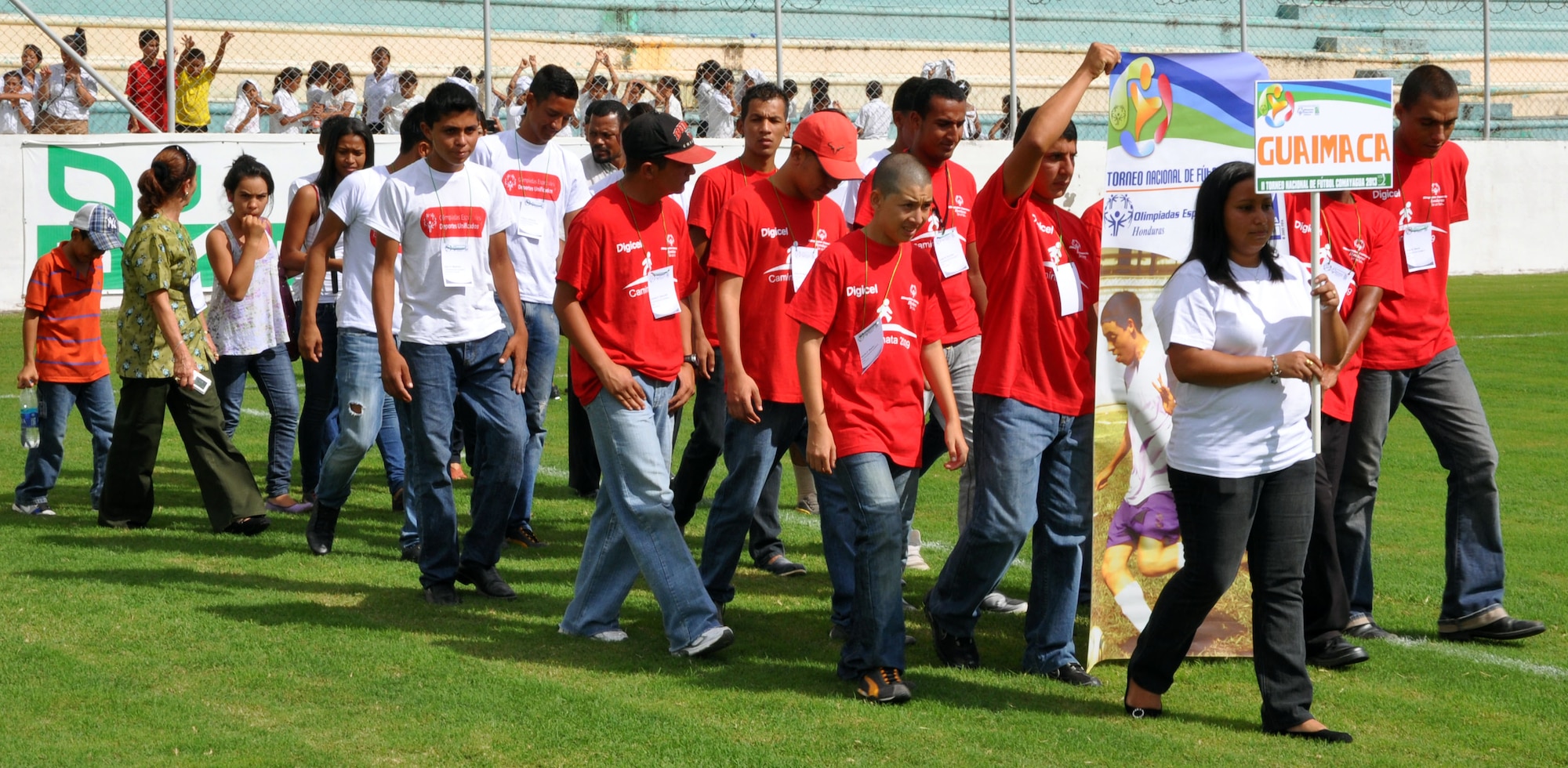 Athletes who will be competing in the Honduras Special Olympics march into Carlos Miranda Stadium, Comayagua, Honduras, during the opening ceremony, Oct. 24, 2013.  Joint Task Force-Bravo is providing support for the Honduras Special Olympics soccer tournament, which will be played at Soto Cano Air Base.  (U.S. Air Force photo by Capt. Zach Anderson)