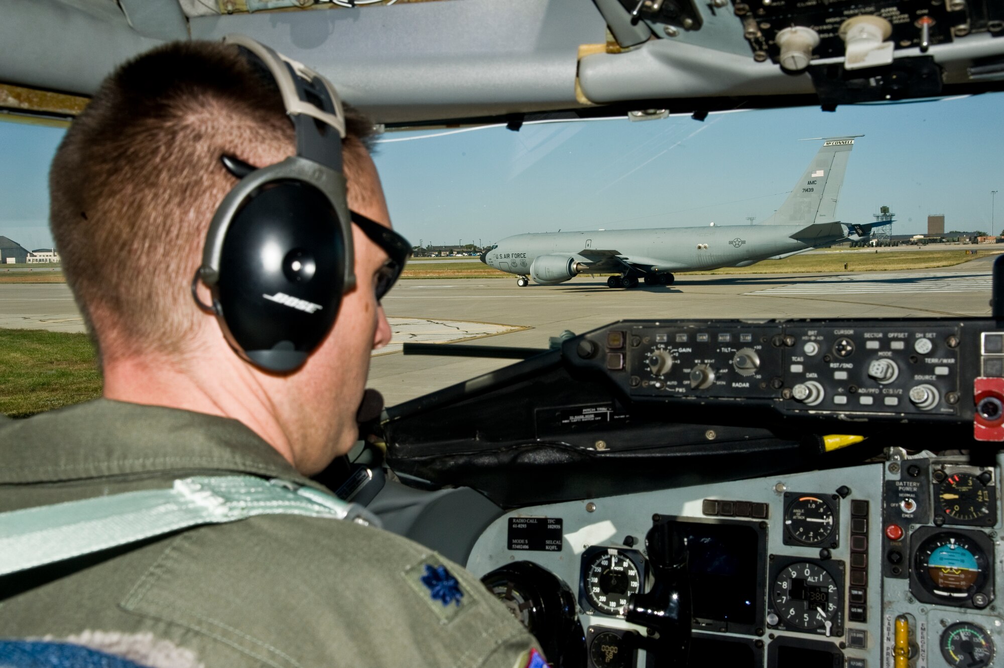 Lt Col. Corbett Peterson, 384th Air Refueling Squadron pilot and deputy officer, taxis a KC-135 Stratotanker along the runway, Oct. 23, 2013, at McConnell Air Force Base Kan. A four ship of tankers refueled four F-22 Raptors assigned to the 49th Fighter Wing, Holloman Air Force Base, N.M. (U.S. Air Force photo/Airman 1st Class John Linzmeier)