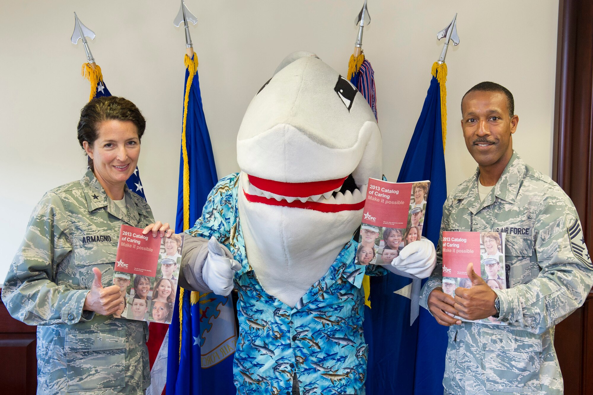 “Snark the Shark” is happy to share a “Thumbs Up” for the CFC Campaign with Brig. Gen. Nina Armagno, commander, 45th Space Wing and Chief Master Sgt. Herman Moyer, 45th Space Wing Command Chief. (U.S. Air Force Photo/Matthew Jurgens)