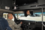 U.S. Air Force Staff Sgt. James McKinney, 802nd Logistics Readiness Squadron dispatcher, checks out the interior of a 12-passenger surrey bus Tuesday, at Joint Base San Antonio-Randolph. JBSA-Randolph became the location for the Distinguished Visitor Transportation Support Center in April.(Photo by Airman 1st Class Kenna Jackson)