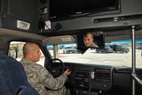 U.S. Air Force Staff Sgt. James McKinney, 802nd Logistics Readiness Squadron dispatcher, checks out the interior of a 12-passenger surrey bus Tuesday, at Joint Base San Antonio-Randolph. JBSA-Randolph became the location for the Distinguished Visitor Transportation Support Center in April.(Photo by Airman 1st Class Kenna Jackson)