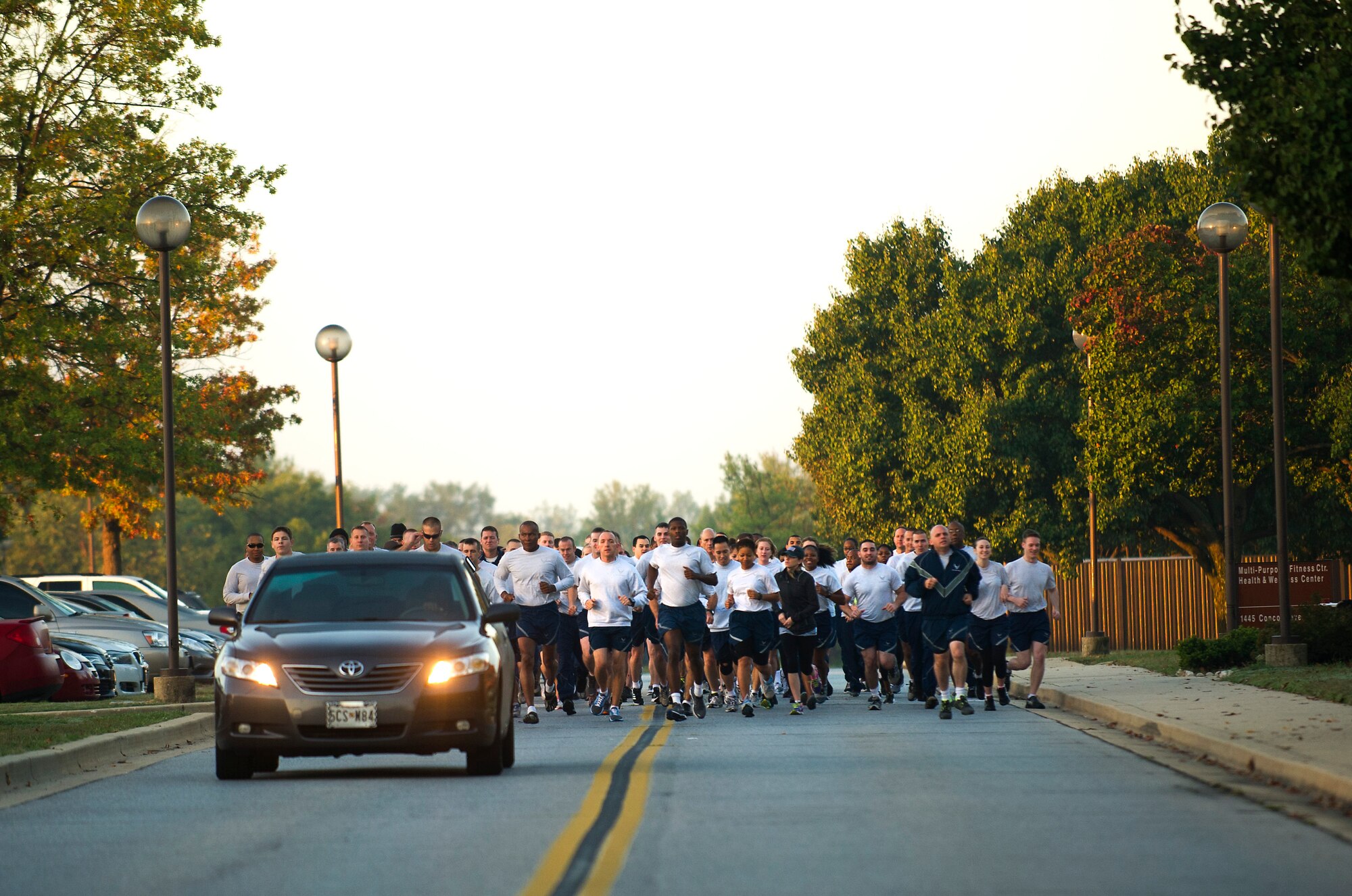 Approximately 128 runners compete in the Joint Base Andrews' Energy Action Month 5K Fun Run Oct. 15, 2013. The event featured four-member teams representing the Air Force District of Washington and other Joint Base Andrews units. Each team member's finish time was averaged to determine the fastest team. AFDW/A4/7 won the race with an average run time of 24:03. (U.S. Air Force photo/Master Sgt. Jeffery Allen)