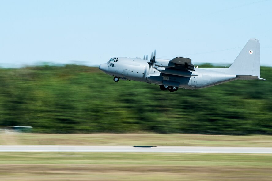 A new Afghanistan Air Force C-130 takes off to Afghanistan, Sept. 22, 2013, at Little Rock Air Force Base, Ark. The first two C-130H aircraft were delivered to the AAF on Oct. 9, 2013, a vital addition to standing up the AAF overseas. (U.S. Air Force photo by Staff Sgt. Russ Scalf)     