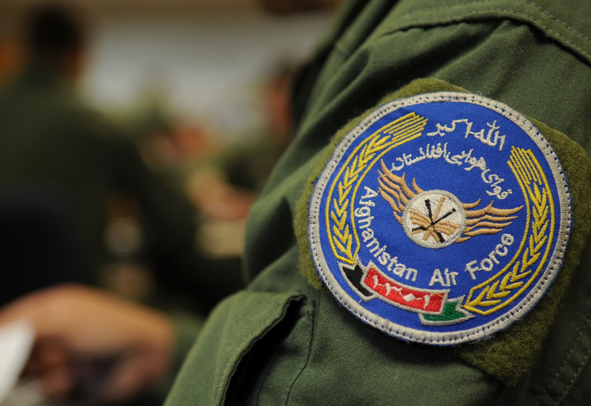 Afghanistan Air Force Lt. Col. Aimal Sayedi Pacha, pilot, prepares for his first flight in a C-130 during training with the 62nd Airlift Squadron Sept. 3, 2013, at Little Rock Air Force Base, Ark. Pacha and Lt. Khial Shinwari, the first two Afghan C-130 pilots, began their training and in-processing with the 714th Training Squadron here. (U.S. Air Force photo by Staff Sgt. Caleb Pierce)