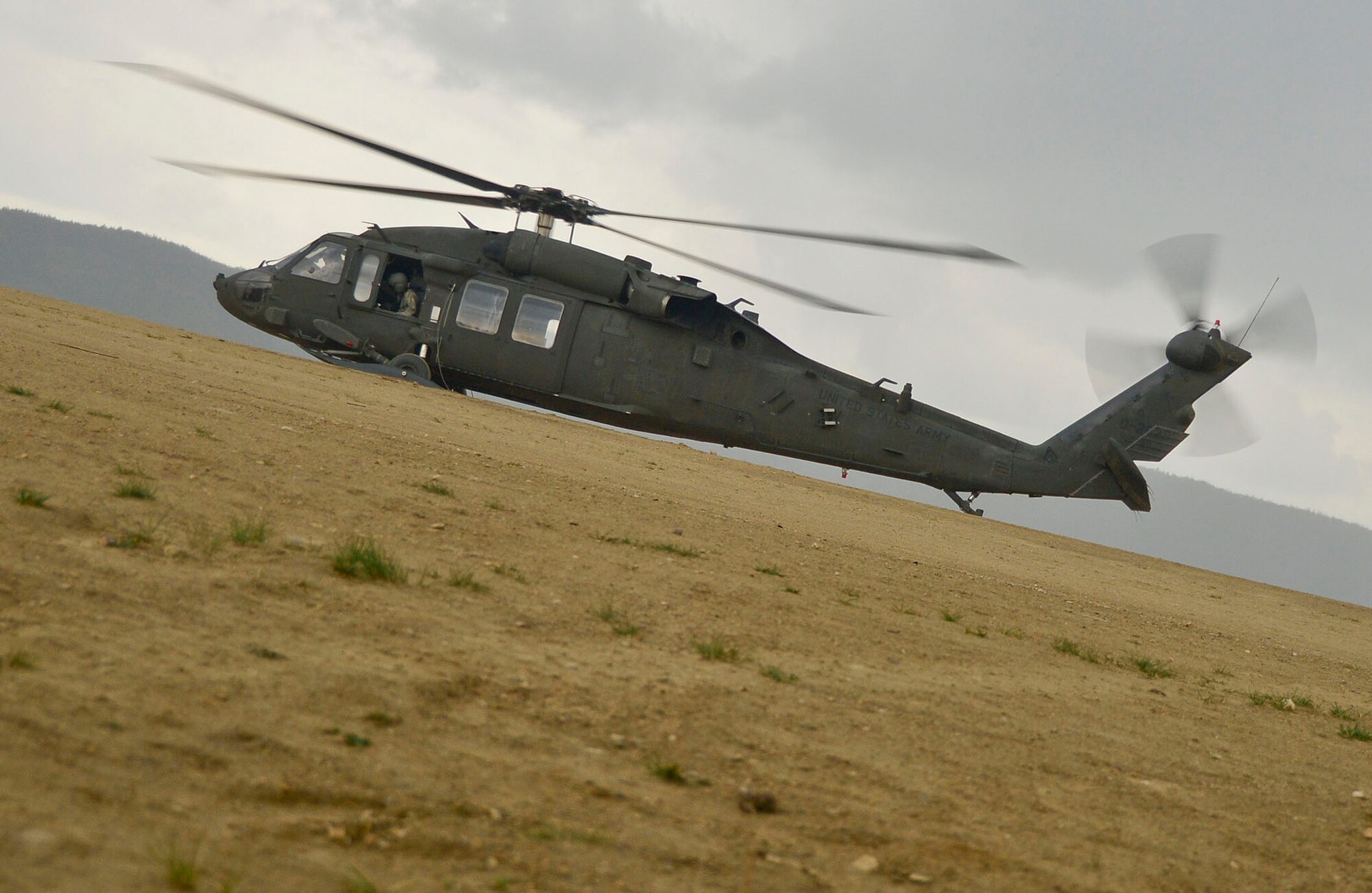 A Black Hawk helicopter prepares for take off on Aug. 19, 2013 during Red Flag – Alaska at Eielson AFB. Red Flag – Alaska is joint base air combat exercise where participating U.S. and coalition forces refine combat skills in a realistic threat environment. (U.S. Air Force Photo by Tech. Sgt. Roberta A. Thompson/Released)