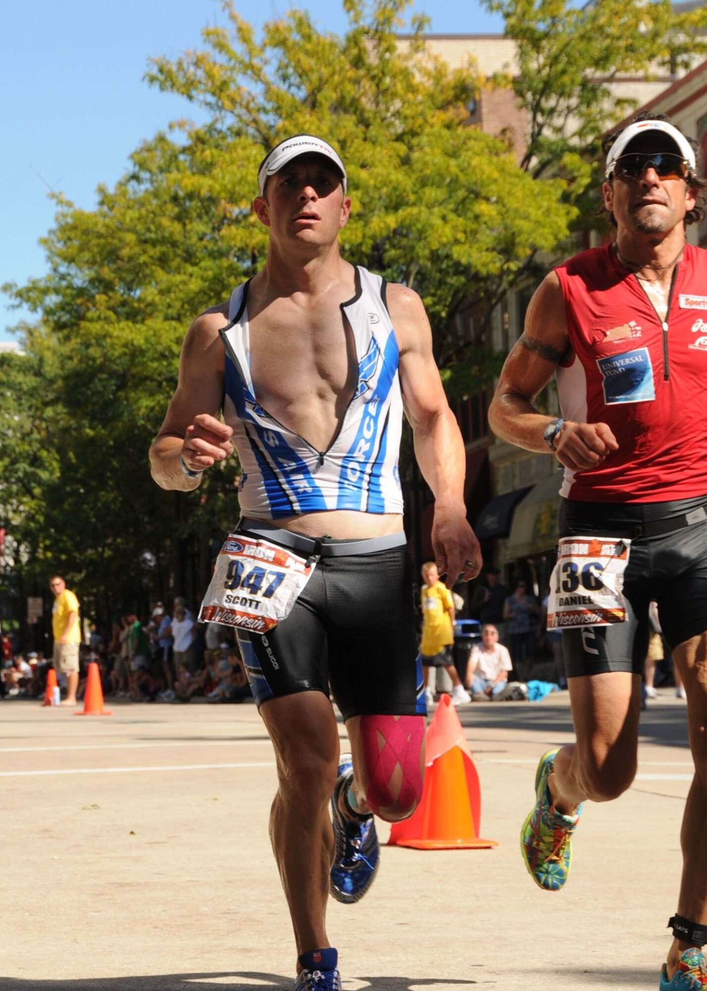 Lt. Col. Scott Poteet, 31st Operations Group deputy, crosses the finish line during an Ironman World Championship qualifier in Ariz. Poteet recently completed the 2013 Ironman World Championship in Kailua-Kona, Hawaii, where he ranked 343 out of 2,134 participants. (Courtesy photo)