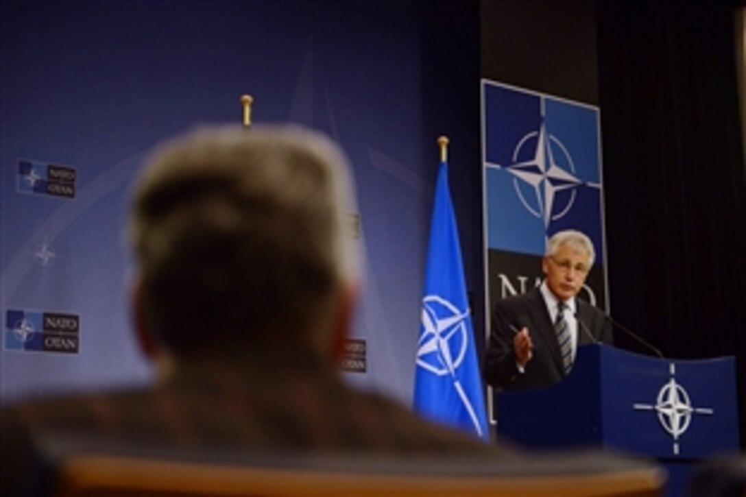 U.S. Defense Secretary Chuck Hagel hosts a press conference at NATO headquarters in Brussels, Oct. 23, 2013. 