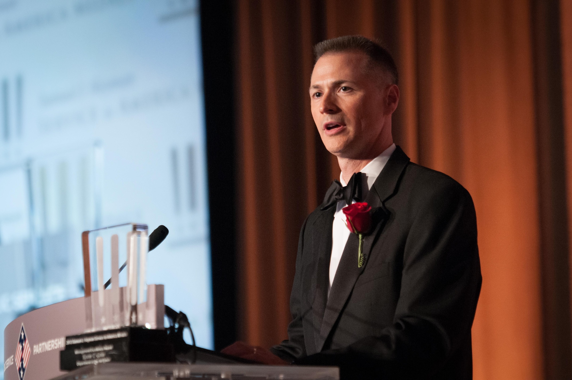 Department of the Air Force's Kevin Geiss makes remarks after receiving the 2013 Service to America Management Excellence Medal, Oct. 3, 2013 at the Andrew W. Mellon Auditorium in Washington, D.C. (Courtesy photo by Sam Kittner)
