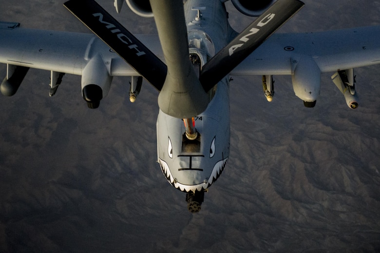 An A-10C Thunderbolt II receives fuel from a KC-135 Stratotanker over Afghanistan Oct. 2, 2013. The A-10 is deployed from Moody Air Force Base, Ga., to the 74th Expeditionary Fighter Squadron in support of Operation Enduring Freedom. The KC-135 is assigned to the 340th Expeditionary Air Refueling Squadron. (U.S. Air Force photo/Staff Sgt. Stephany Richards)
