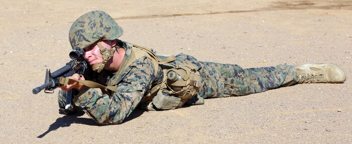 Pvt. Mark C. Cook, Platoon 2121, Company F, 2nd Recruit Training Battalion, provides security for his squad during the Crucible at Edson Range aboard Marine Corps Base Camp Pendleton, Calif. Oct. 15. Recruits must complete more than 30 missions during the Crucible working together as a team.

