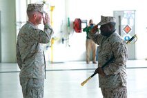 Sgt. Maj. Michael Diggs salutes Col. Michael Orr during his releif and appointment ceremony, at the Marine Medium Tiltrotor Squadron 204 hangar, Oct. 11. Diggs, handed the responsibilities as senior enlisted advisor to Sgt. Maj. Clive O'Conner. Diggs retired from the Marine Corps after 30 years of honorable service.